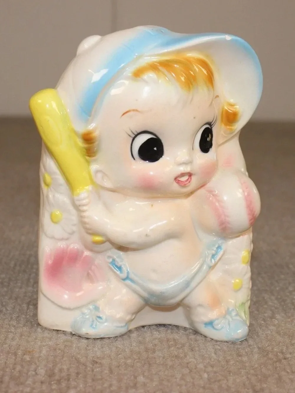 Vintage Ceramic Baby Figurine with Pastel Blue and Yellow Accents